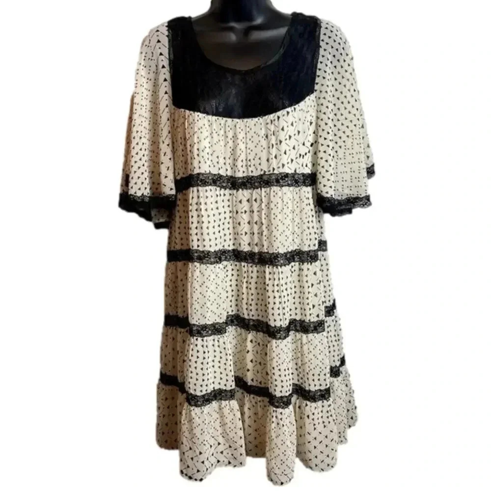 MISS Me Couture flowy dress with flutter sleeves and‎ lace details